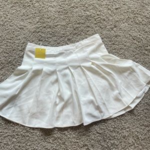 Pleated White Tennis-Style Skirt
